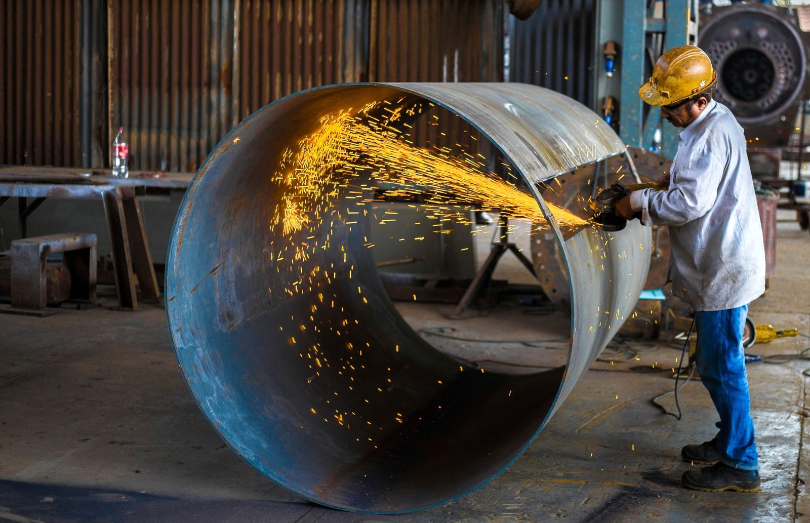Metal fabrication and cutting work at Royal Fabrication workshop in Pune