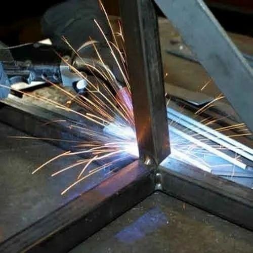 MIG welding a mild steel joint at Royal Fabrication's Pune workshop